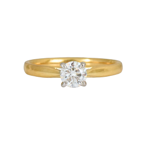 Two tone diamond solitaire engagement ring